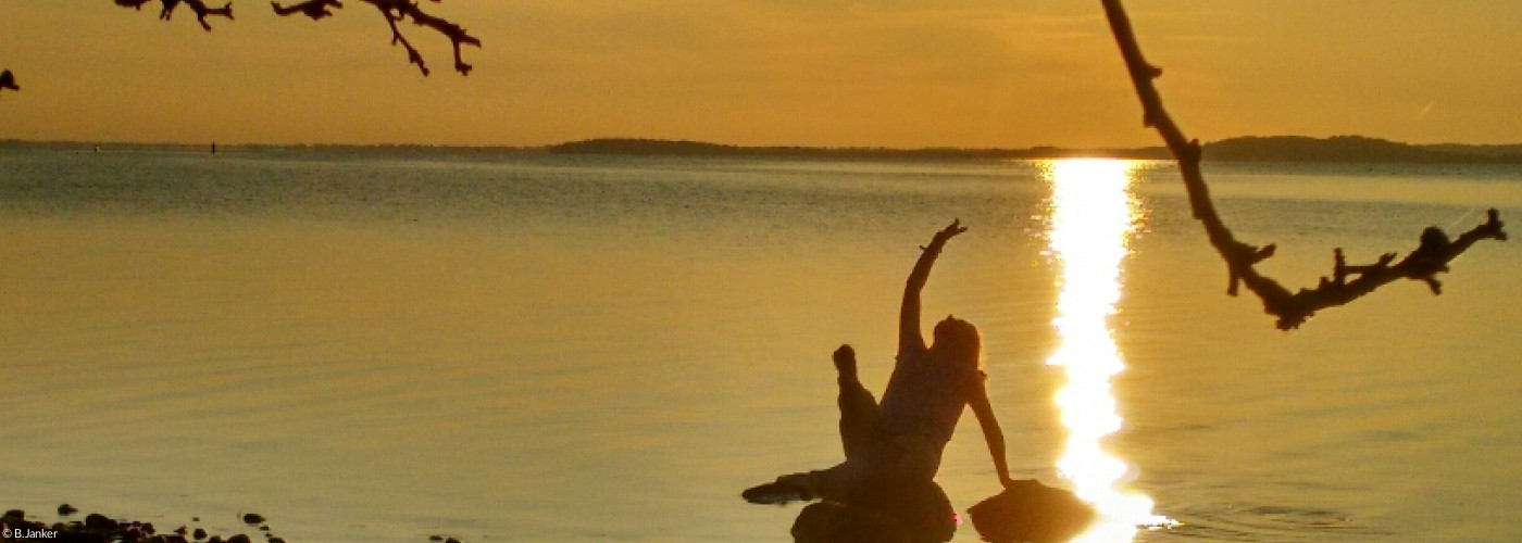 Yoga vor Sonnenuntergang